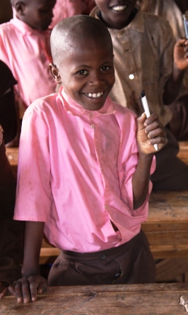 We promised every child in Kaluoki Village a pencil or pen--and we delivered.  Much joy over a mere pencil!